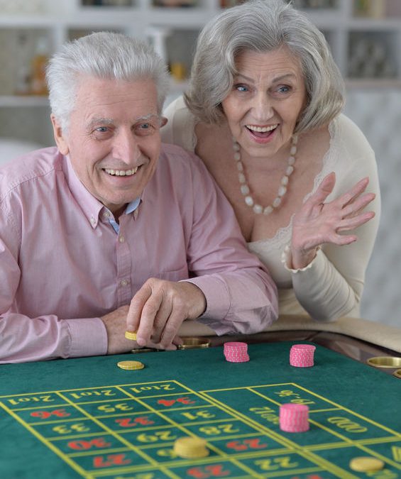senior couple gambling